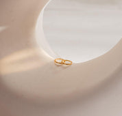 Dainty Diamond Huggie Earrings in Gold