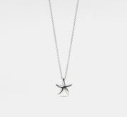 Dainty Starfish Charm Necklace in Sterling Silver